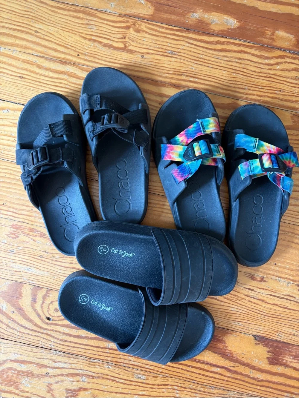 Two pairs of Chaco sanders and cat and jack slides.
